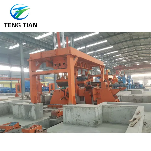 Steel coil slitting line with coil car and slitter head in workshop