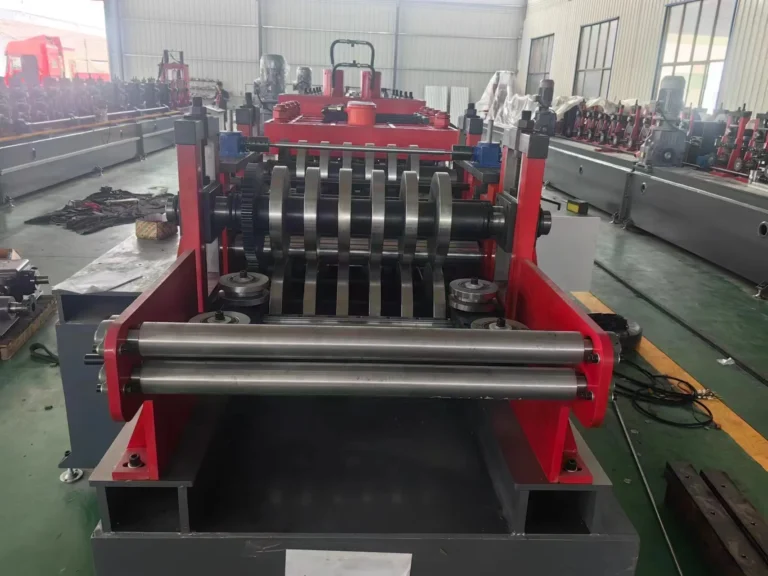 Purlin roll forming line: the forming rolls with the section running beneath
