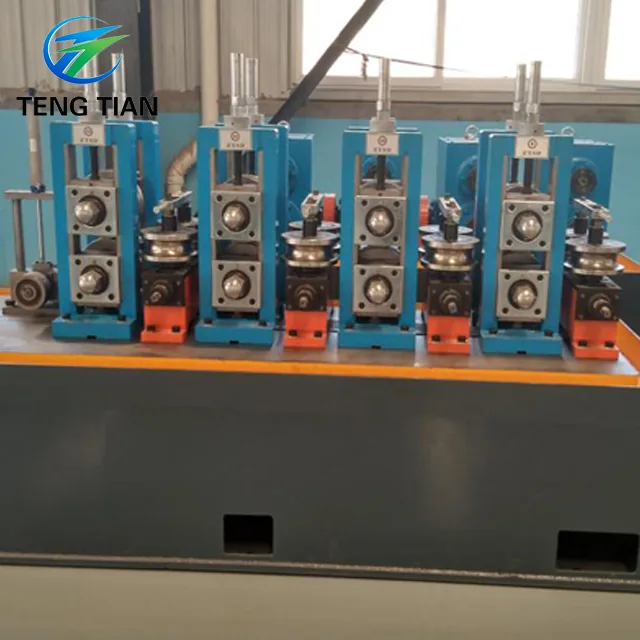 HG32 tube mill line on the base frame, orange cylinder covers on the stands