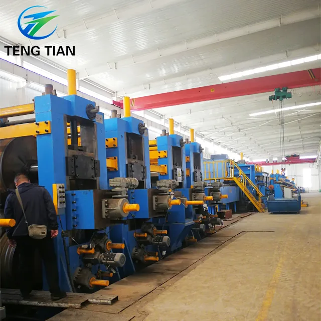 HG426 tube mill line, forming stands with an operator alongside