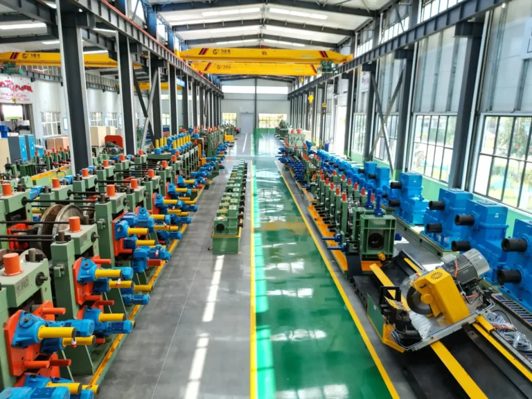Workshop bay with several tube mill lines and an overhead crane